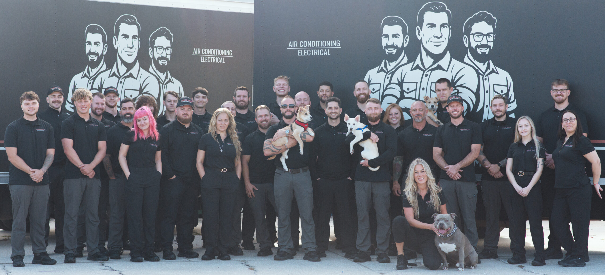 Full team photo of the Three Guys Master Tradesmen staff