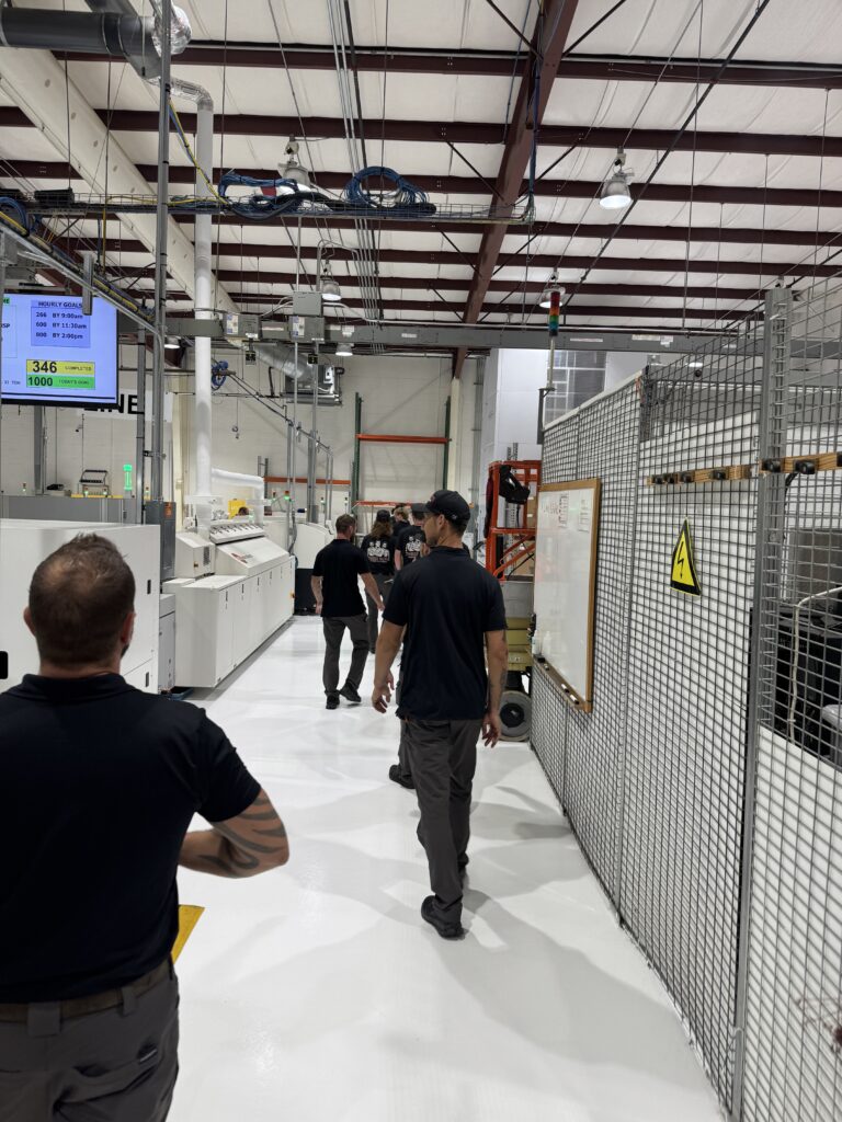 Three Guys Master Tradesmen technicians touring an industrial training facility